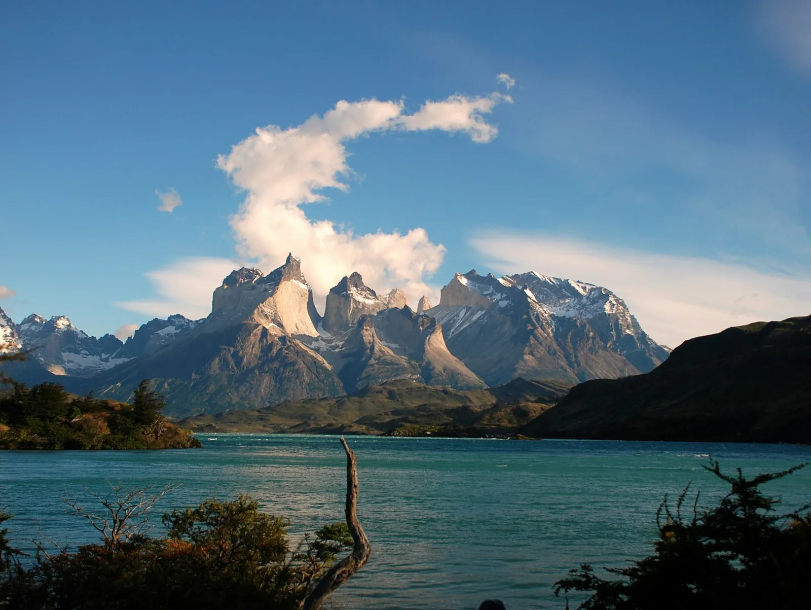The granite towers of Torres del Paine standing above a glacial lake in Patagonia.