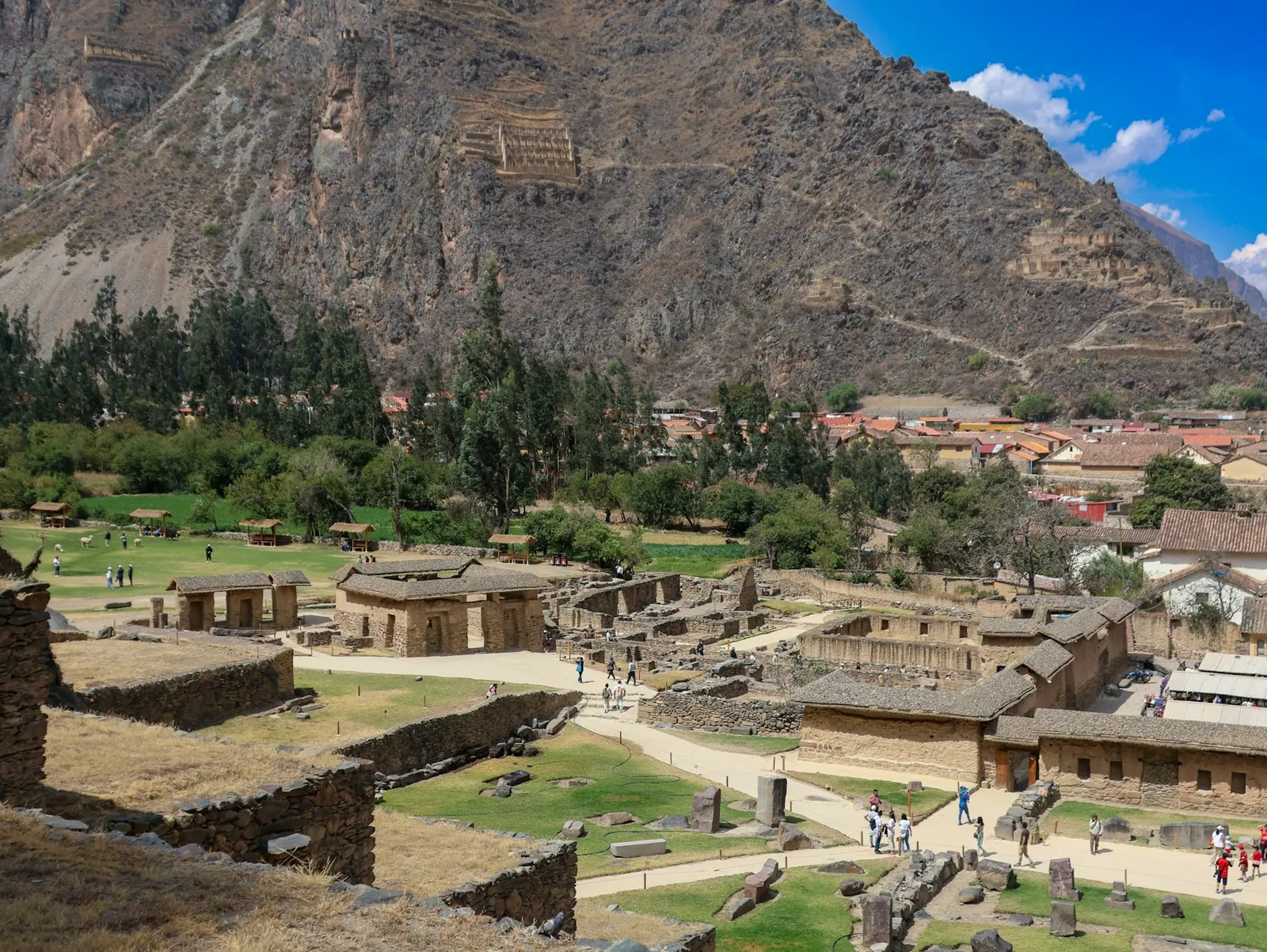 A stone village set into the terraced mountainsides of Peru's Sacred Valley.